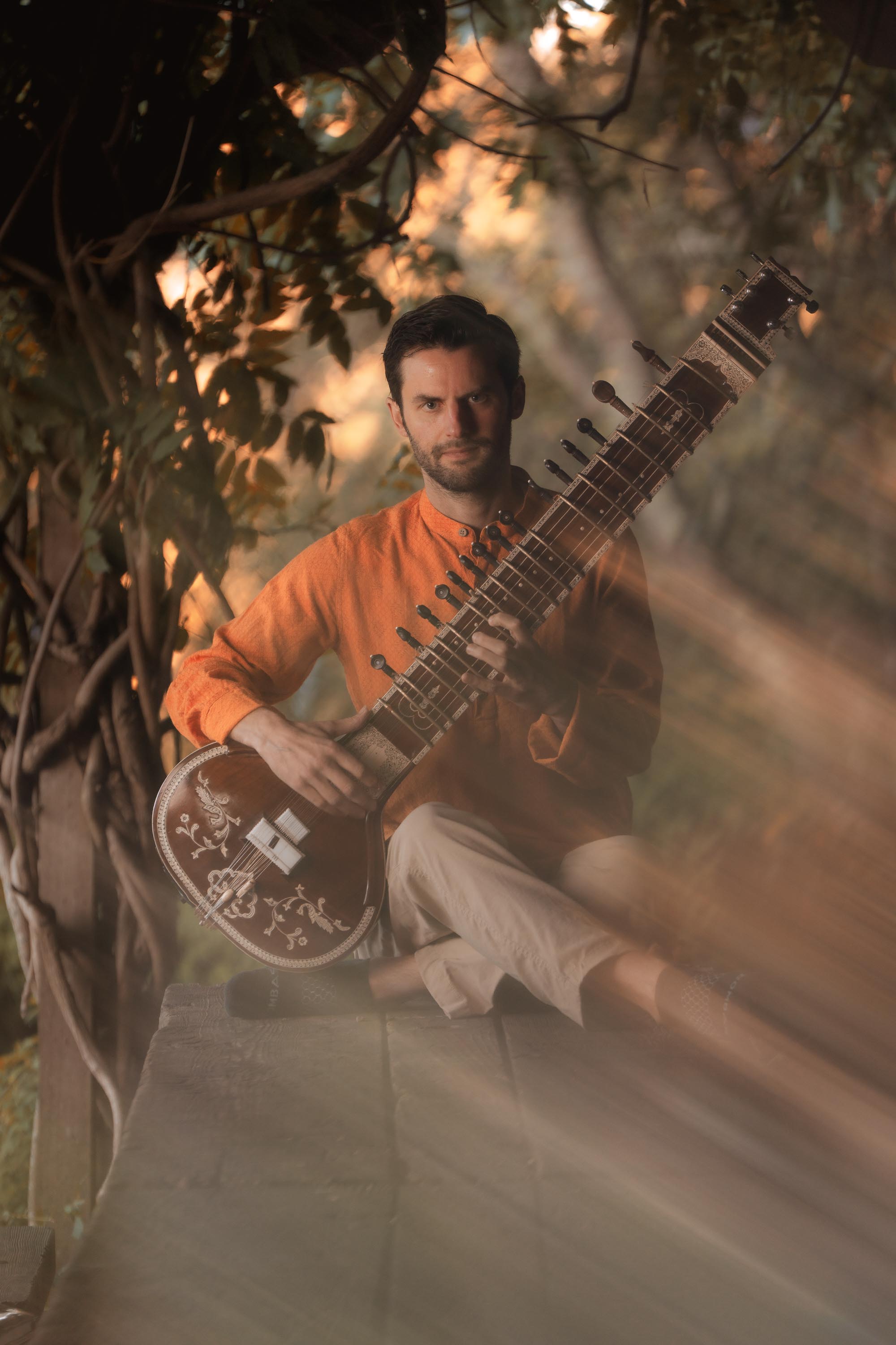 Will Marsh holding a sitar